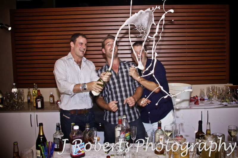 Celebrating with a champagne shower - party photography sydney